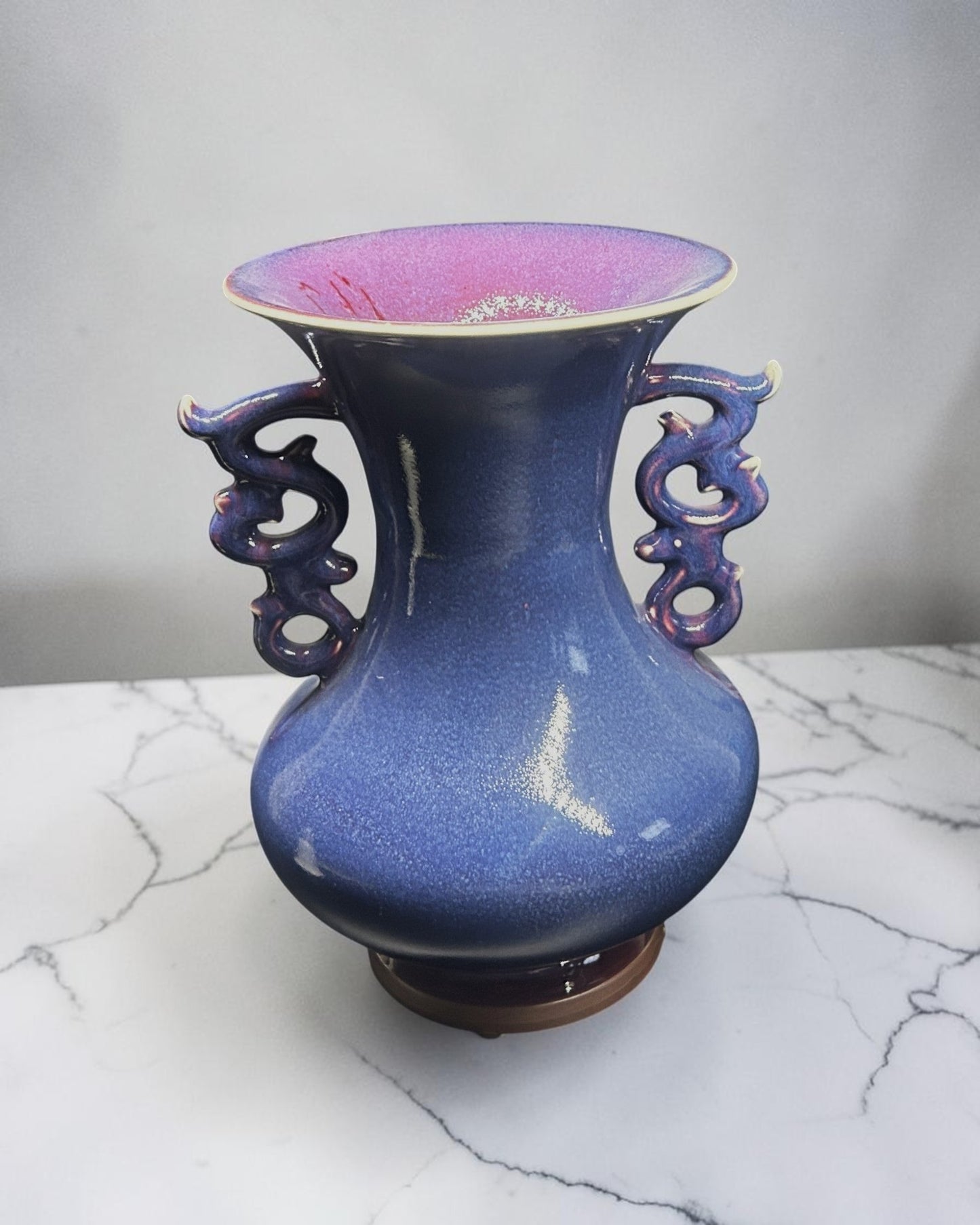 C&C Atelier deep blue speckled ceramic vase with flared rim and dragon-shaped handles, perfect for decor.