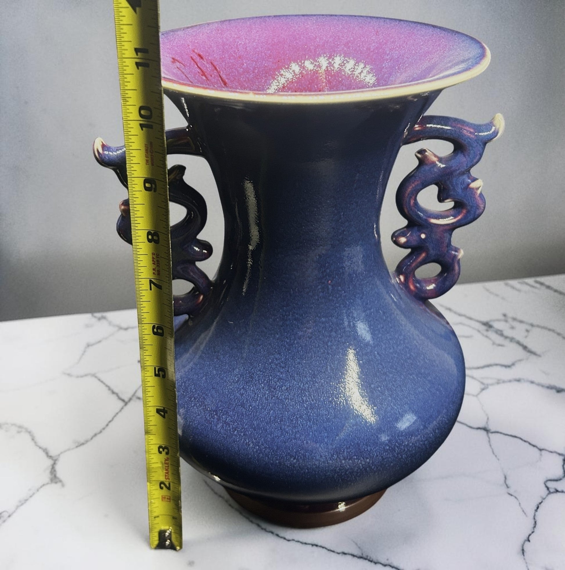 C&C Atelier deep blue ceramic vase with dragon handles and flared rim, speckled glaze, decorative accent.